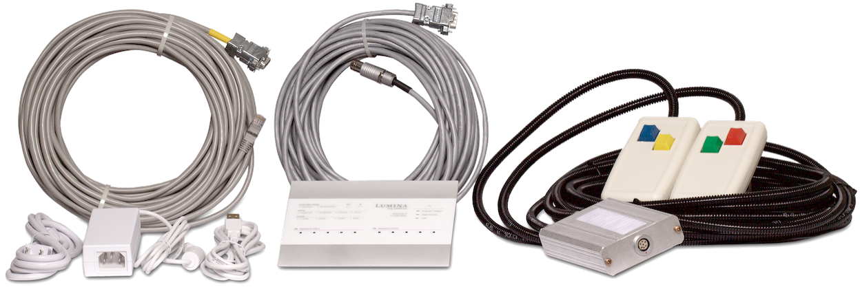 Picture of components that make up a Lumina system: controller, two cables 65 foot long each, response pad model of your choice, and AC adapter.